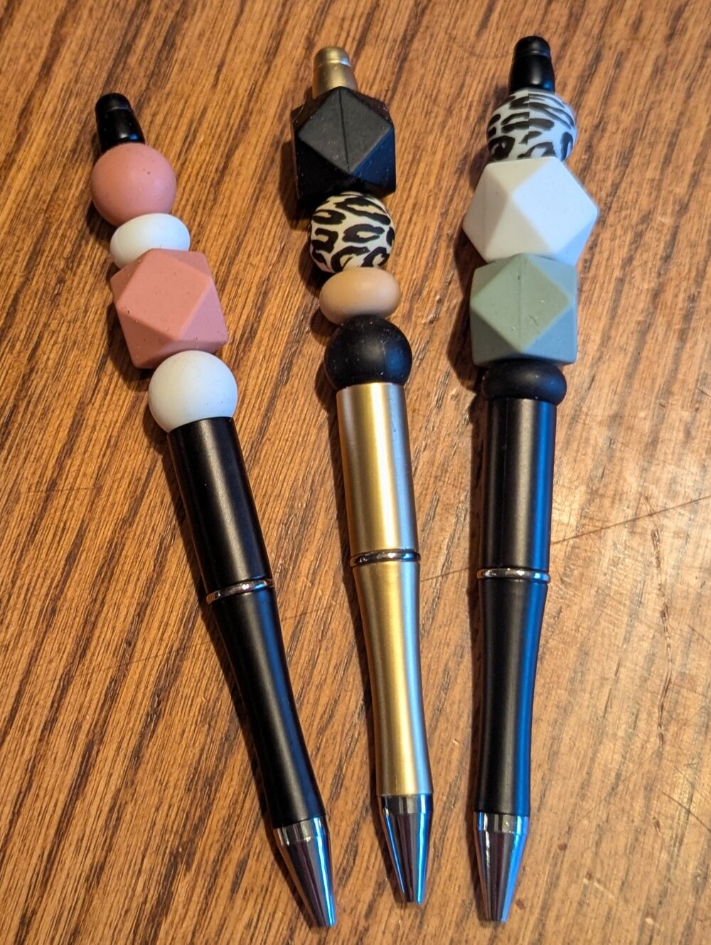 Silicone beaded pens with ink refills